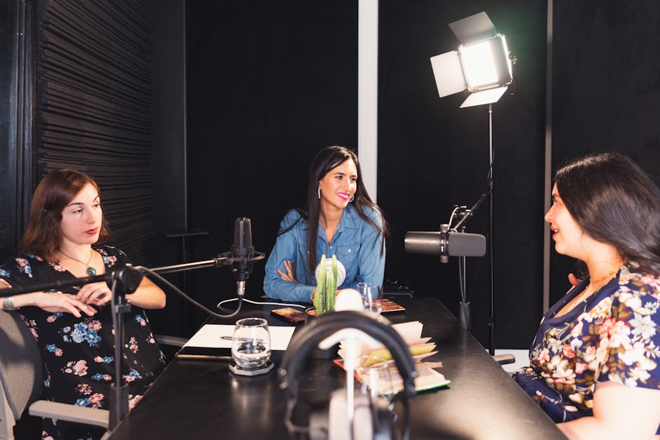 Group discussion in a modern recording studio setting